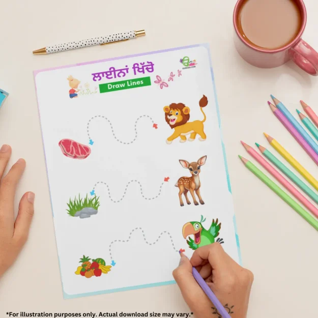 A person is tracing with a pencil on a line tracing worksheets on the table, near some colored pencils, a pen, and a cup.