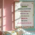 A poster of Punjabi quotes wall art is framed on a pink and blue wall with some pillows placed below.